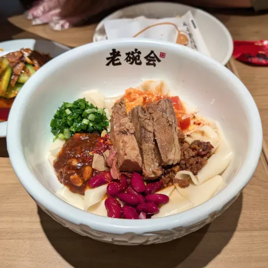 https://d2rzpmb54mcyw0.cloudfront.net/content/guides/shenzhen/noodles2.webp